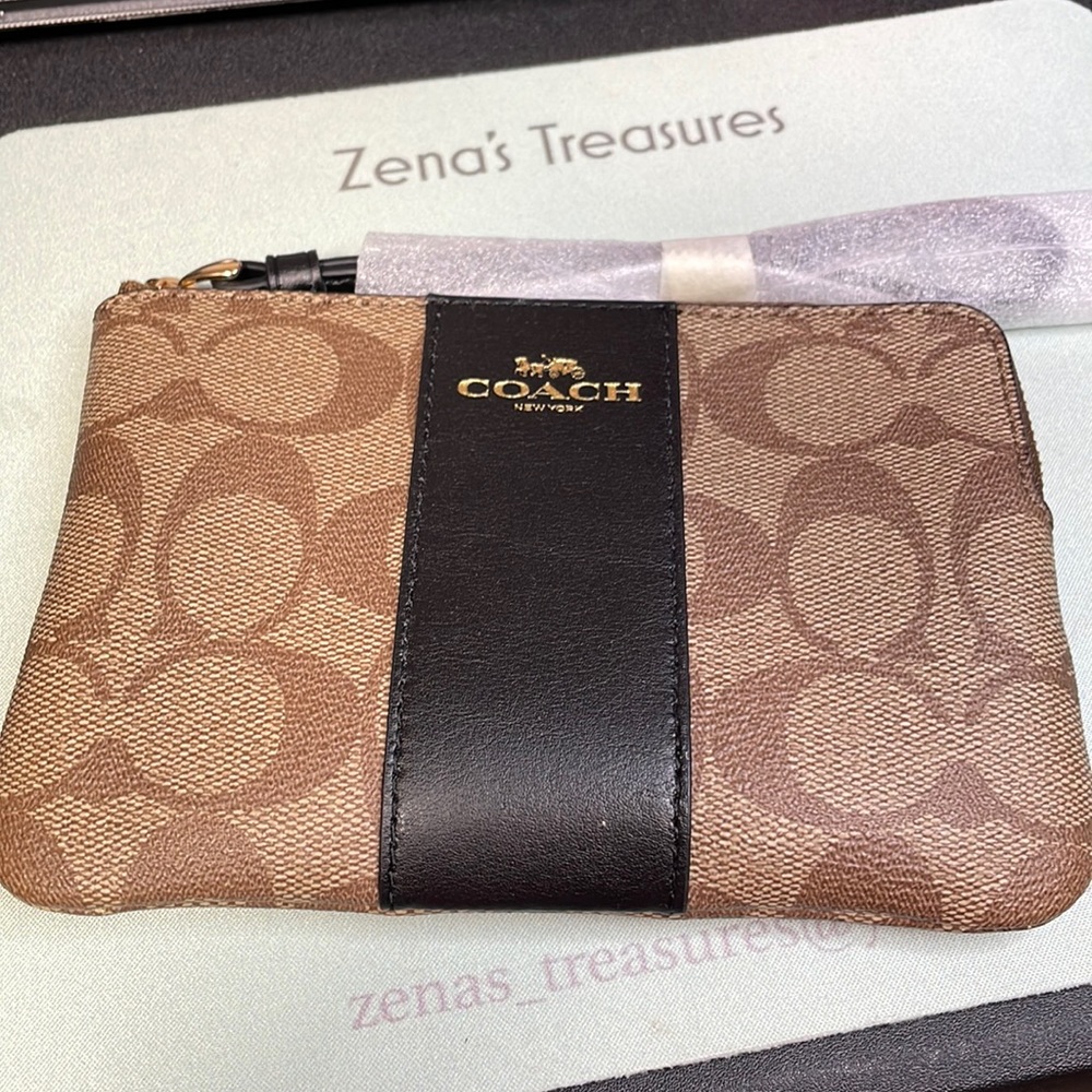 Coach Corner Zip Wristlet In Signature Canvas Khaki Brown with Black Strip